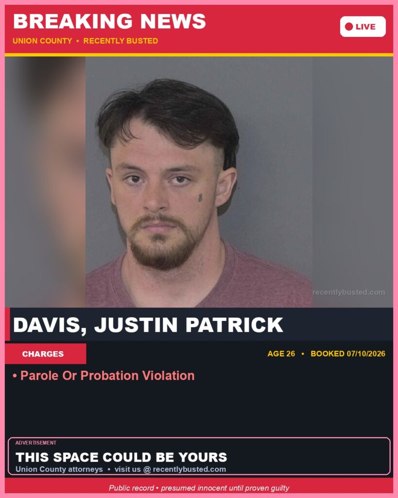 Booking photo of DAVIS, JUSTIN PATRICK
