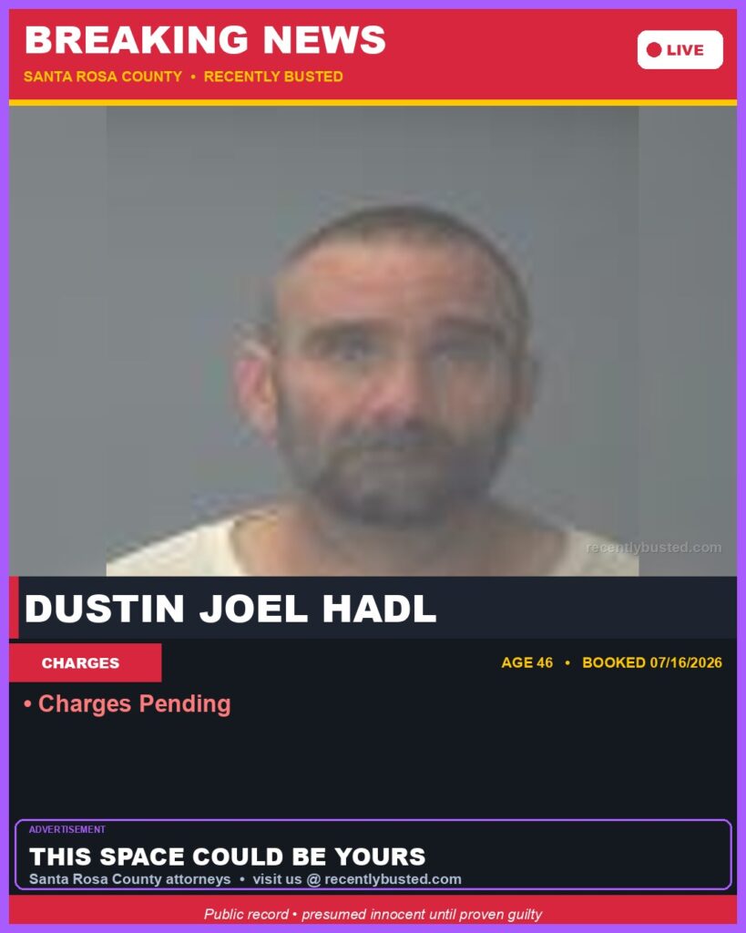 Booking photo of Dustin Joel Hadl