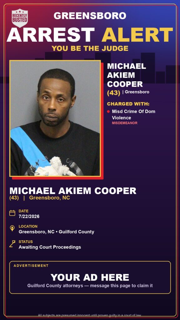 Booking photo of MICHAEL AKIEM COOPER